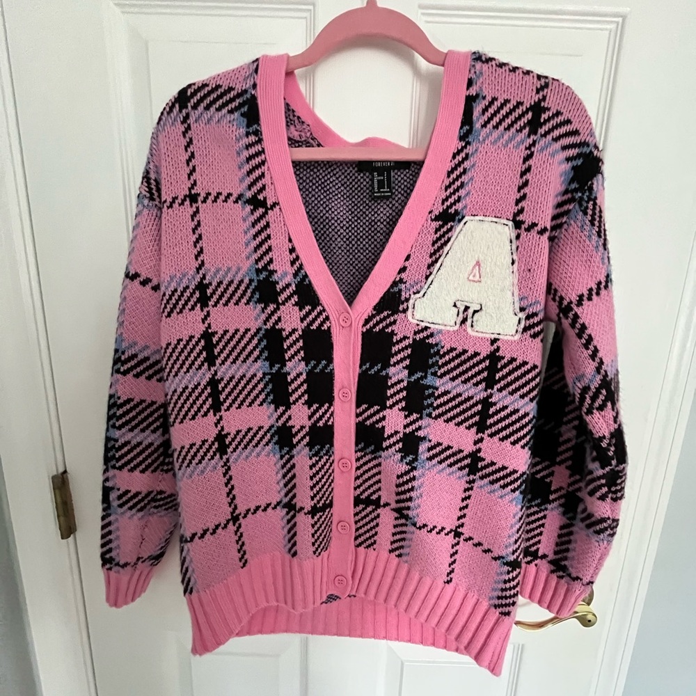 Pink cardigan/sweater